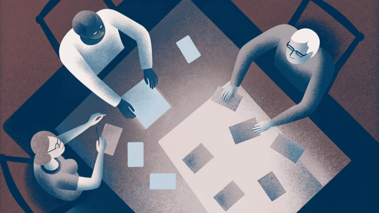 Команда играет в офлайн-квиз за столом